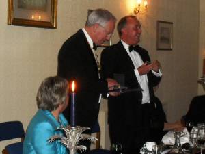 Outgoing President Roy Wood presents David Bruce with the Rotary Paul Harris Fellowship Award